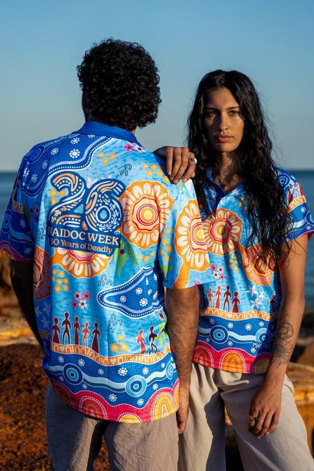 (Bulk) Built On Strong Shoulders NAIDOC 2026 Women's Fitted Polo Shirt