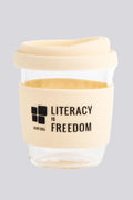 Aboriginal Art Kitchen Warehouse-"Literacy is Freedom" Coastal Cream Keep Cup-Yarn Marketplace